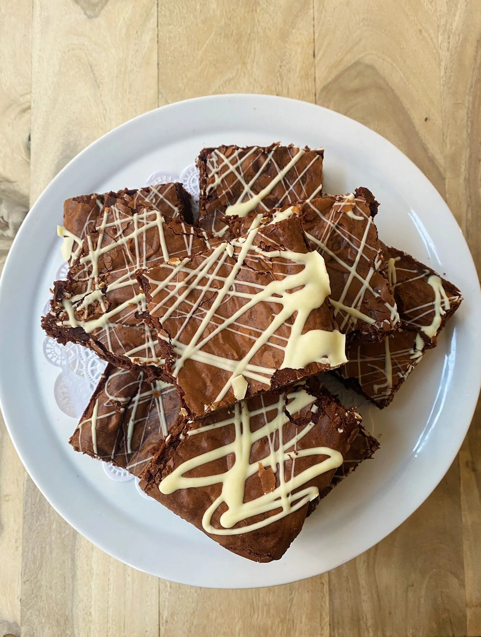 Dark Chocolate Brownie decorated with white chocolate icing