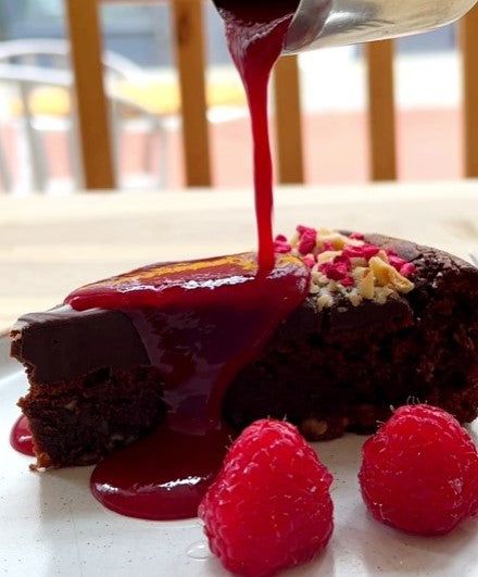 Luxury Natella Chocolate Cake with Raspberry Coulis