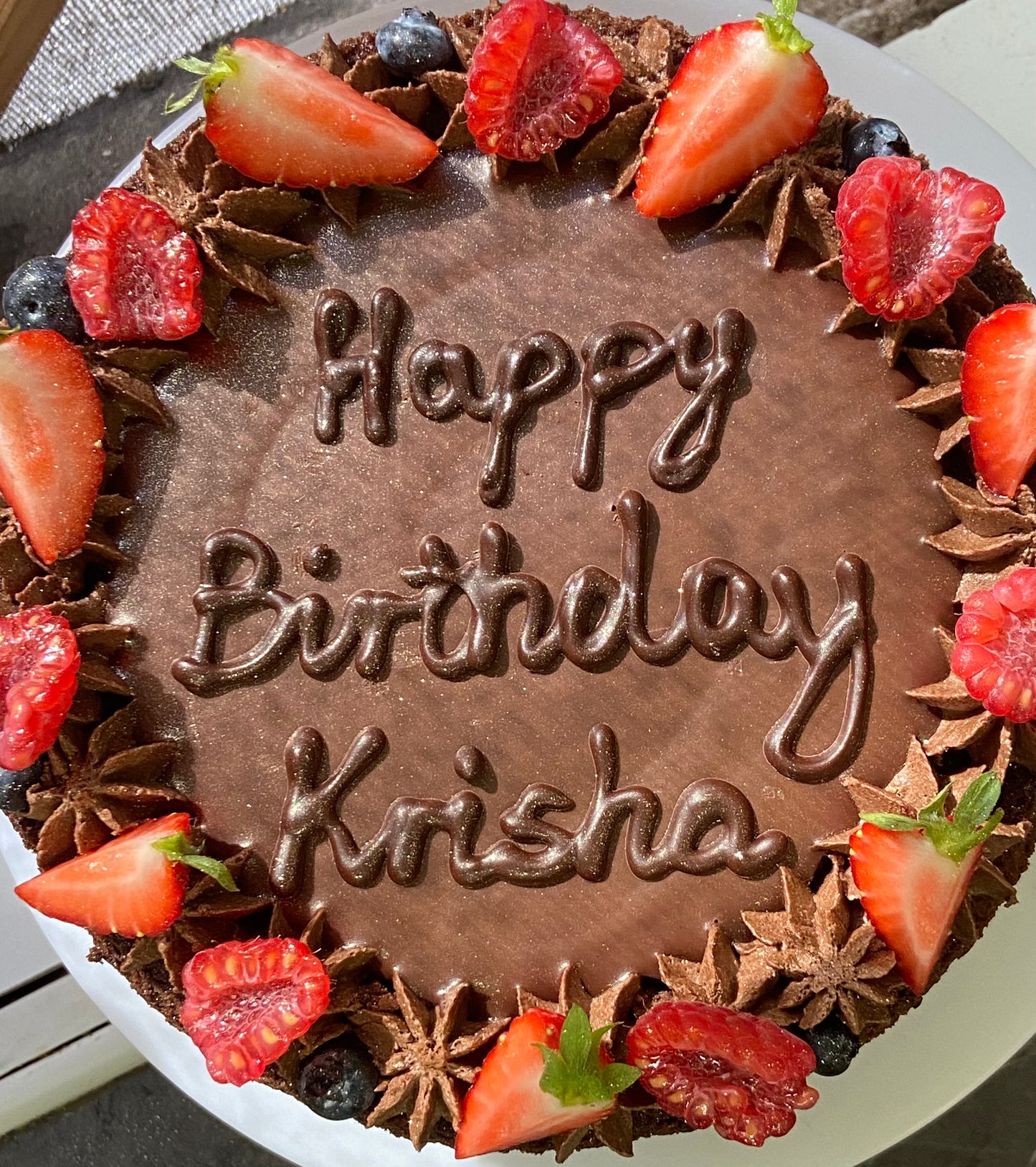 Gluten free plant based chocolate ganache birthday cake fruit decoration